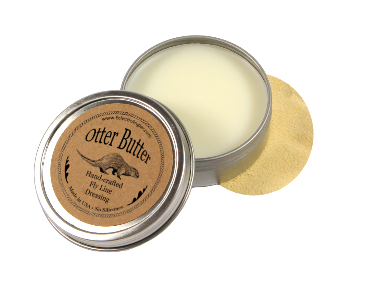 Open Otter Butter tin with applicator cloth